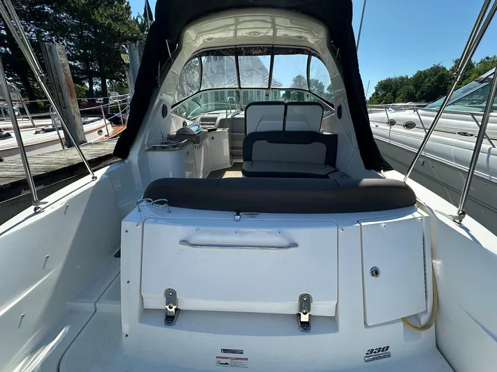 Harborviewbayview Yacht Photos Pics 2016 Sea Ray 330 Sundancer boat interior with seating and helm, docked at marina.