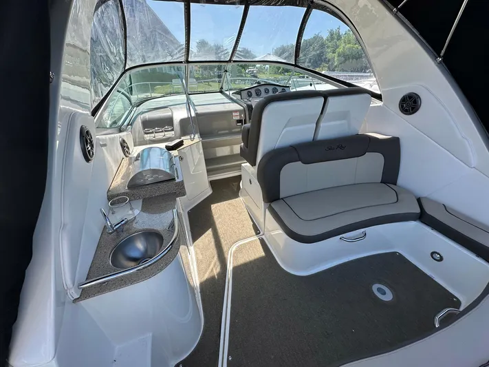 Harborviewbayview Yacht Photos Pics 2016 Sea Ray 330 Sundancer interior with seating, helm, and kitchenette.