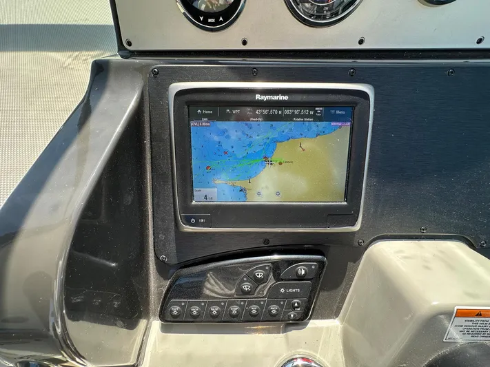 Harborviewbayview Yacht Photos Pics Raymarine navigation system on 2016 Sea Ray 330 Sundancer boat dashboard.