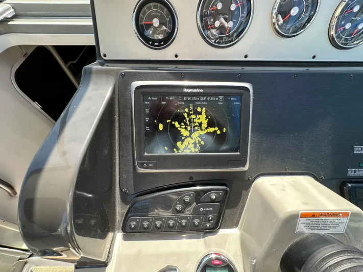 Harborviewbayview Yacht Photos Pics 2016 Sea Ray 330 Sundancer dashboard with Raymarine navigation display and gauges.