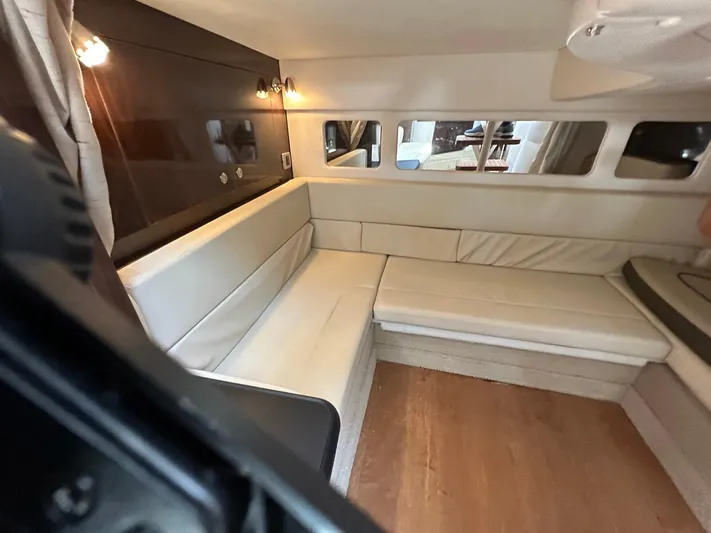 Harborviewbayview Yacht Photos Pics Interior of 2016 Sea Ray 330 Sundancer yacht with beige seating and wood accents.