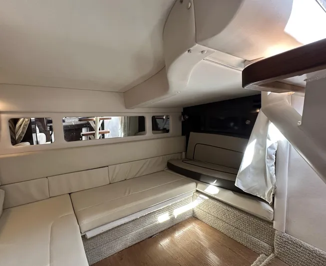 Harborviewbayview Yacht Photos Pics Interior of 2016 Sea Ray 330 Sundancer yacht with beige seating and wood accents.