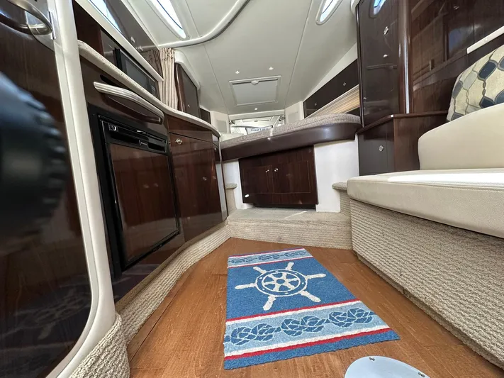 Harborviewbayview Yacht Photos Pics Interior of 2016 Sea Ray 330 Sundancer yacht with elegant wood finishes and nautical decor.