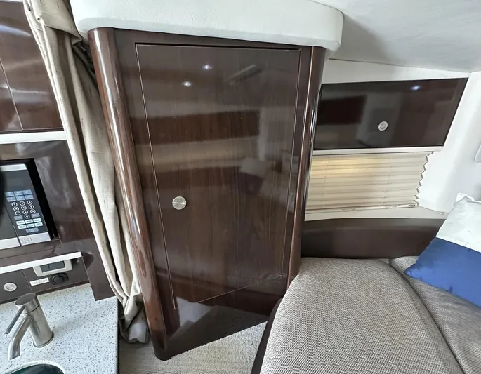 Harborviewbayview Yacht Photos Pics Interior of 2016 Sea Ray 330 Sundancer with wood cabinetry and modern amenities.