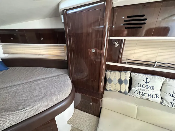 Harborviewbayview Yacht Photos Pics Interior of 2016 Sea Ray 330 Sundancer with cozy seating and nautical-themed pillows.