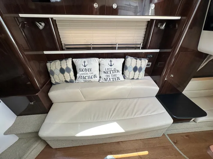 Harborviewbayview Yacht Photos Pics Interior of 2016 Sea Ray 330 Sundancer with cozy seating and nautical-themed pillows.