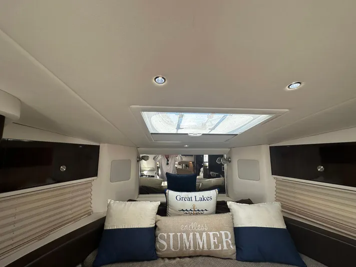 Harborviewbayview Yacht Photos Pics Interior cabin of 2016 Sea Ray 330 Sundancer with decorative pillows and skylight.