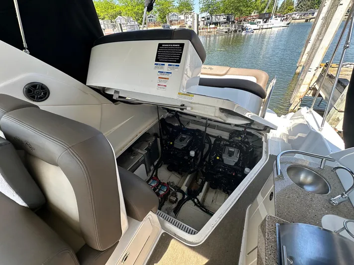 Harborviewbayview Yacht Photos Pics 2016 Sea Ray 330 Sundancer engine compartment with open hatch, dockside view.