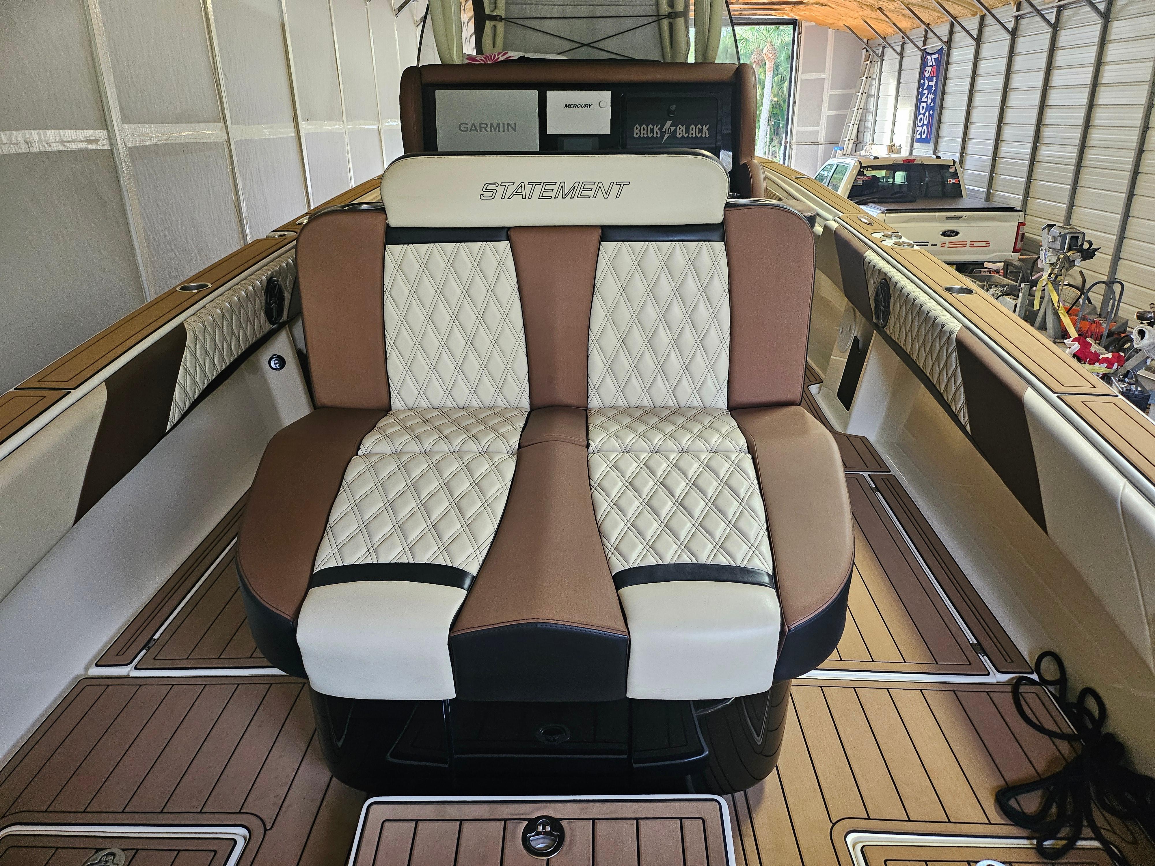Luxury seating on 2021 Statement 350 Open boat, featuring elegant design and premium materials.