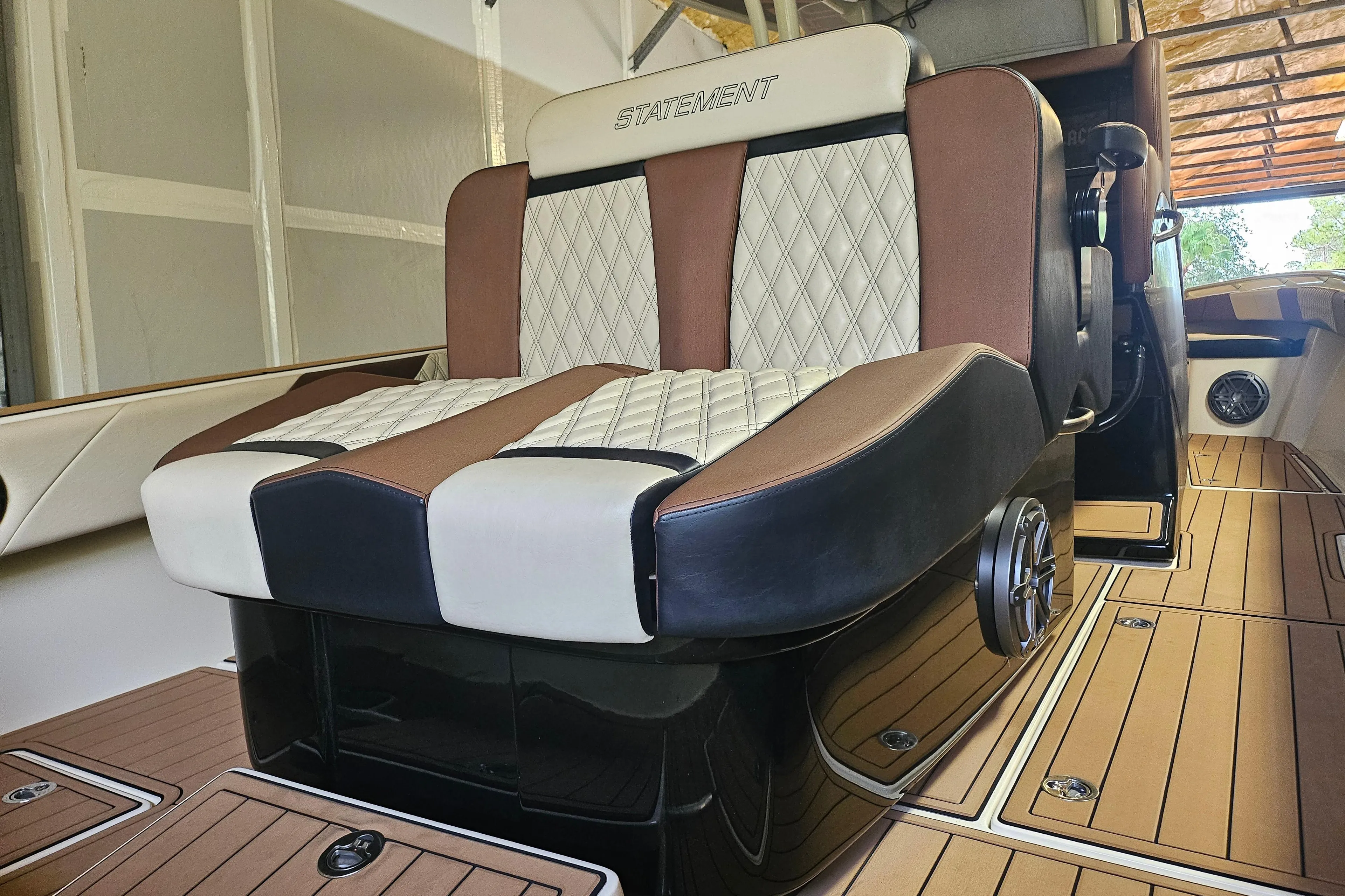 Luxurious seating on 2021 Statement 350 Open boat with diamond-stitched upholstery.