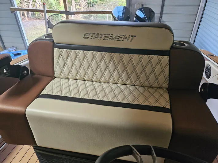  Yacht Photos Pics Luxurious seating on 2021 Statement 350 Open boat with diamond-pattern upholstery.