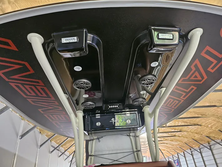  Yacht Photos Pics 2021 Statement 350 Open boat interior with speakers and electronic controls.