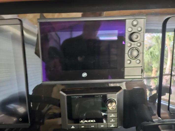  Yacht Photos Pics Control panel of a 2021 Statement 350 Open boat with electronic displays.