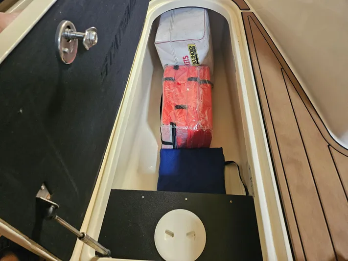  Yacht Photos Pics Storage compartment in 2021 Statement 350 Open boat with safety gear and equipment.