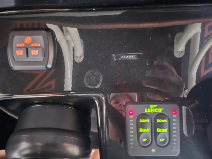  Yacht Photos Pics Control panel of a 2021 Statement 350 Open boat with Lenco trim tab switches.