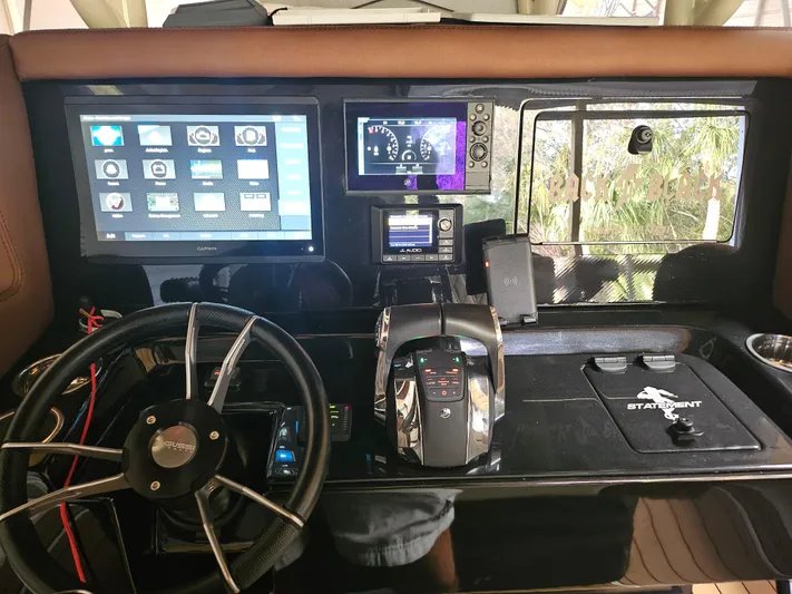  Yacht Photos Pics Control panel of 2021 Statement 350 Open boat with advanced navigation systems.