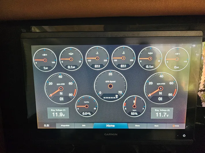  Yacht Photos Pics Dashboard display of a 2021 Statement 350 Open, showing various gauges and engine voltages.