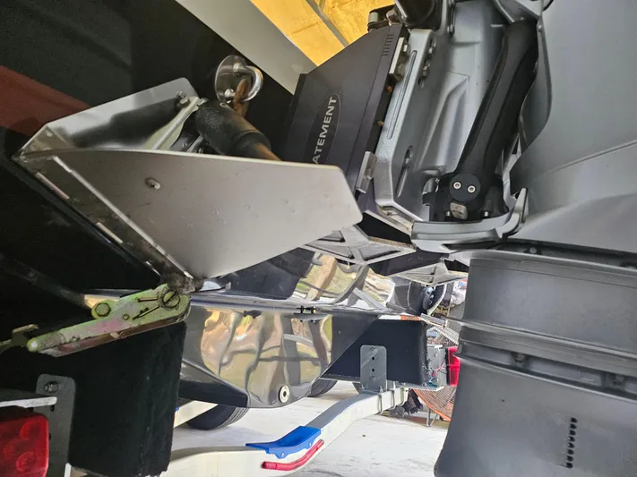  Yacht Photos Pics Close-up of a 2021 Statement 350 Open boat engine and propeller components.