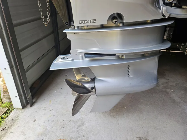  Yacht Photos Pics 2021 Statement 350 Open boat engine propeller in a garage.