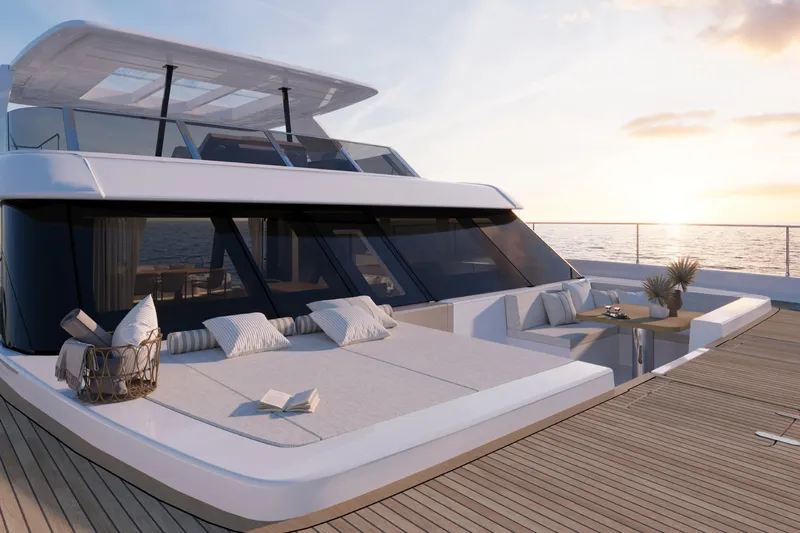  Yacht Photos Pics Luxurious 2026 60 Sunreef Power yacht deck at sunset, featuring elegant seating and decor.
