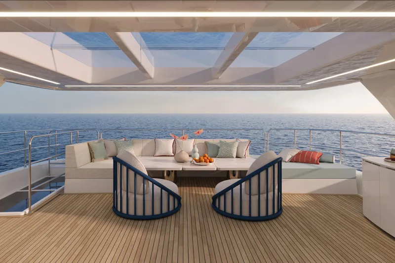  Yacht Photos Pics Luxurious deck of 2026 60 Sunreef Power yacht with ocean view and elegant seating.