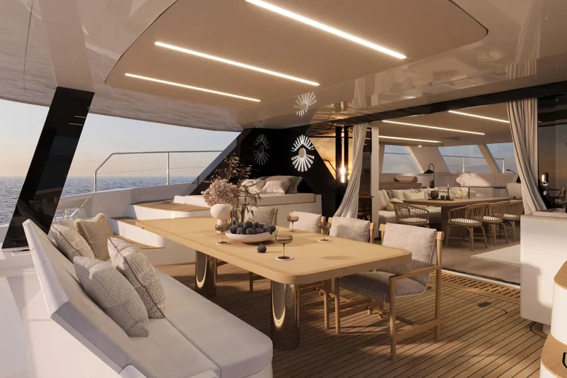  Yacht Photos Pics Luxurious interior of 2026 60 Sunreef Power yacht with elegant dining area and ocean view.