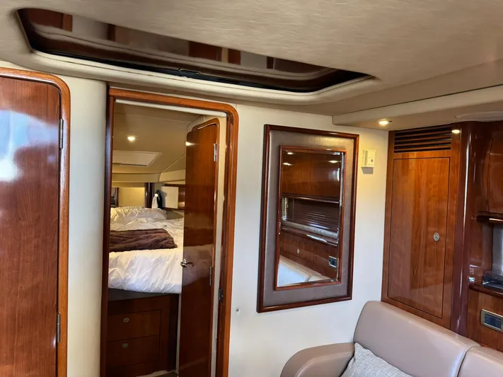  Yacht Photos Pics Interior of 2004 Sea Ray 390 Sundancer yacht with wood finishes and cozy cabin.
