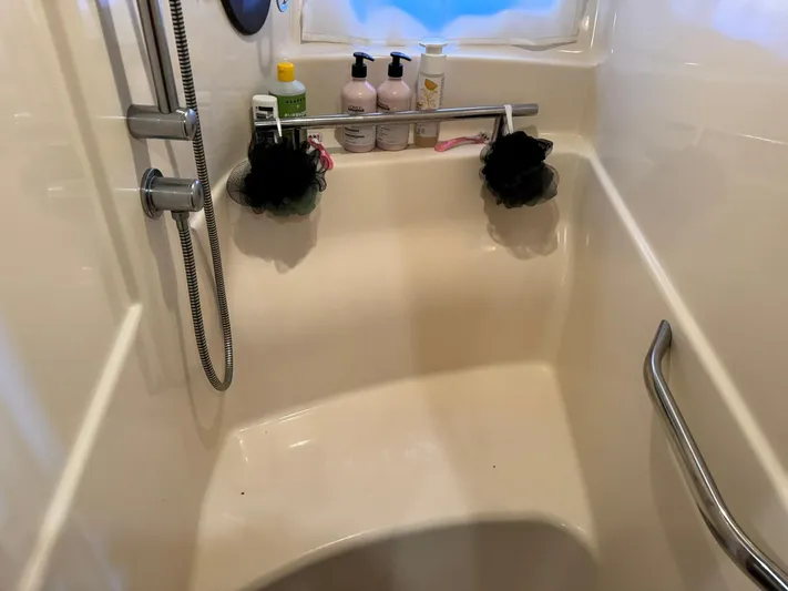  Yacht Photos Pics Shower area in 2004 Sea Ray 390 Sundancer yacht with toiletries and handrail.