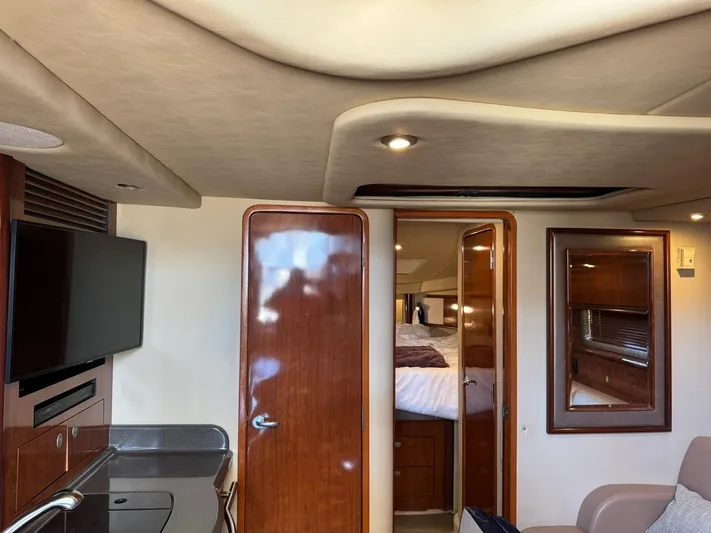  Yacht Photos Pics Interior of 2004 Sea Ray 390 Sundancer yacht with wood finishes and modern amenities.