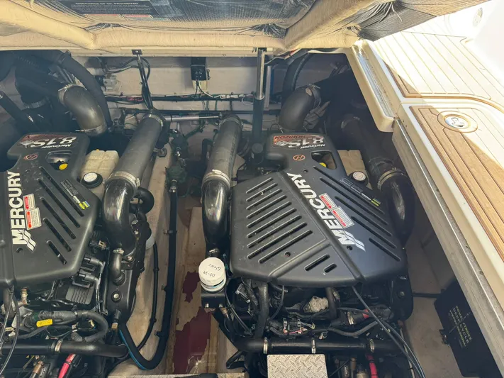 Yacht Photos Pics Engine compartment of a 2004 Sea Ray 390 Sundancer with twin Mercury engines.