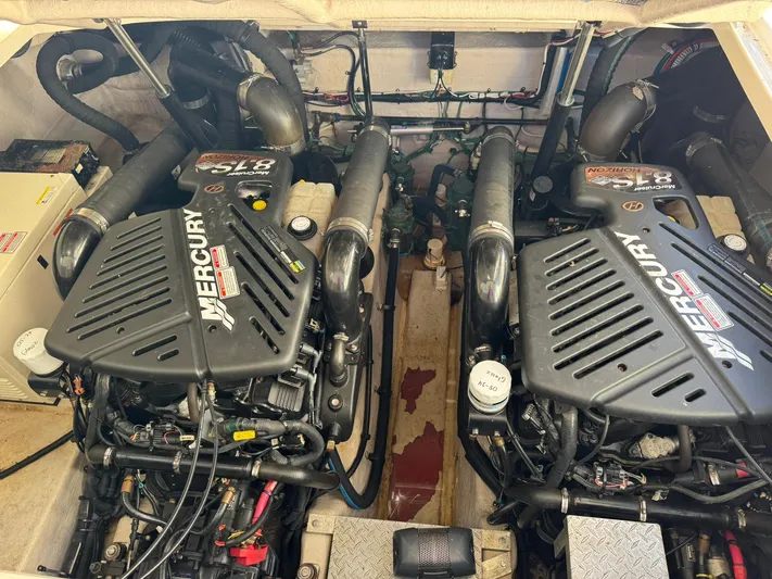  Yacht Photos Pics Twin Mercury engines in a 2004 Sea Ray 390 Sundancer boat engine room.