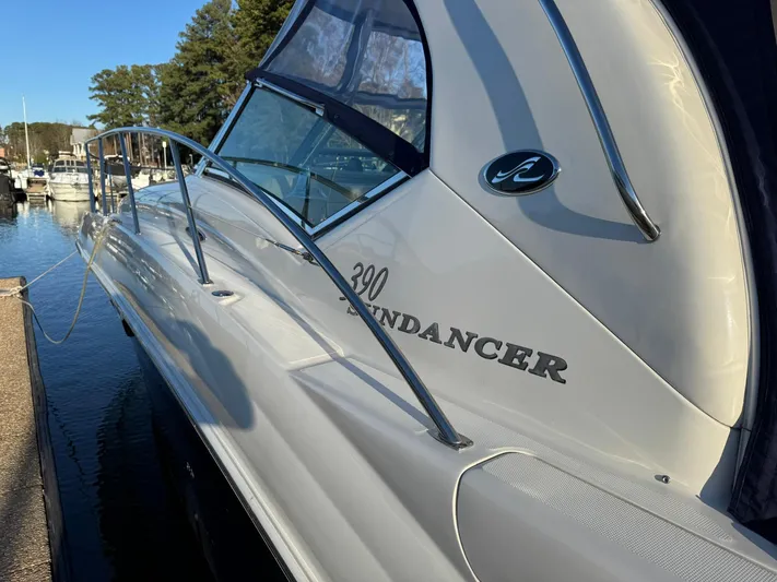  Yacht Photos Pics 2004 Sea Ray 390 Sundancer yacht docked at marina, side view with clear branding.