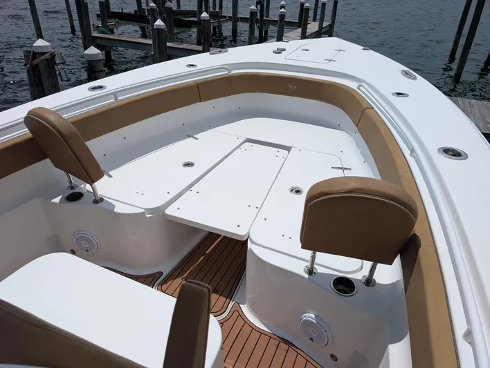 Under Pressure Yacht Photos Pics 2020 Sea Hunt Gamefish 30 Forward Seating boat with tan cushions and spacious deck.