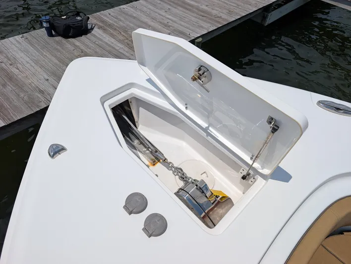 Under Pressure Yacht Photos Pics Open anchor compartment on 2020 Sea Hunt Gamefish 30 boat at dock.