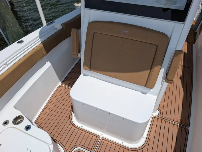 Under Pressure Yacht Photos Pics 2020 Sea Hunt Gamefish 30 boat with forward seating and teak flooring.