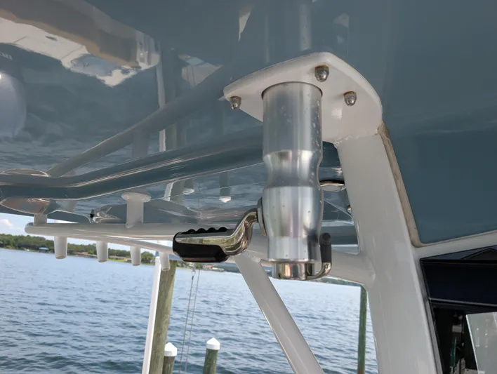 Under Pressure Yacht Photos Pics Close-up of a 2020 Sea Hunt Gamefish 30 T-top rod holder on a boat.