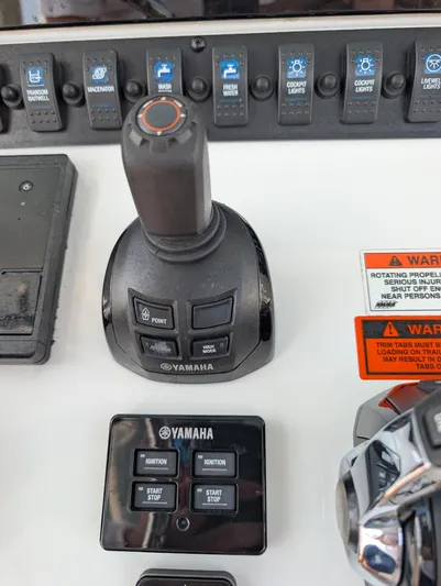 Under Pressure Yacht Photos Pics Control panel of a 2020 Sea Hunt Gamefish 30 with Yamaha joystick and switches.