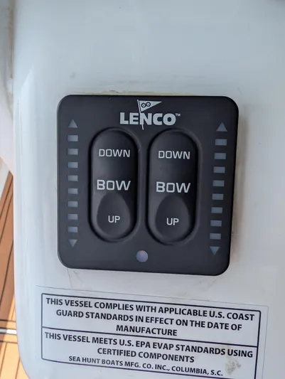 Under Pressure Yacht Photos Pics Control panel on a 2020 Sea Hunt Gamefish 30 boat, featuring Lenco trim tab switches.