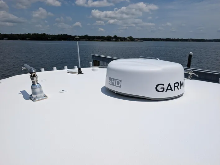 Under Pressure Yacht Photos Pics 2020 Sea Hunt Gamefish 30 with Garmin xHD radar on calm water.