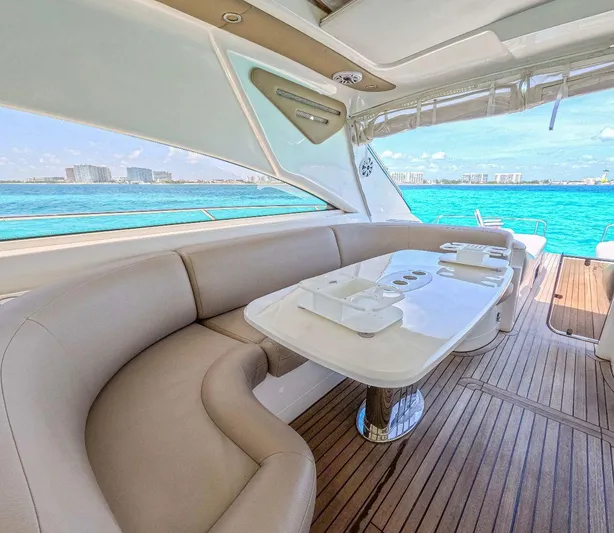 Incentive Yacht Photos Pics Luxurious 2004 Princess 65 yacht interior with elegant seating and ocean view.