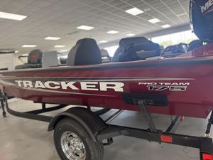 2025 Tracker Pro Team 175 boat displayed indoors on a trailer.