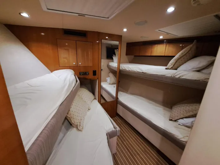 Mary Rose Yacht Photos Pics Interior of 2006 Hatteras 68 Convertible yacht with cozy bunk beds.