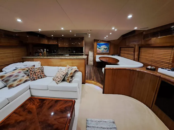 Mary Rose Yacht Photos Pics Luxurious interior of 2006 Hatteras 68 Convertible yacht with elegant furnishings.