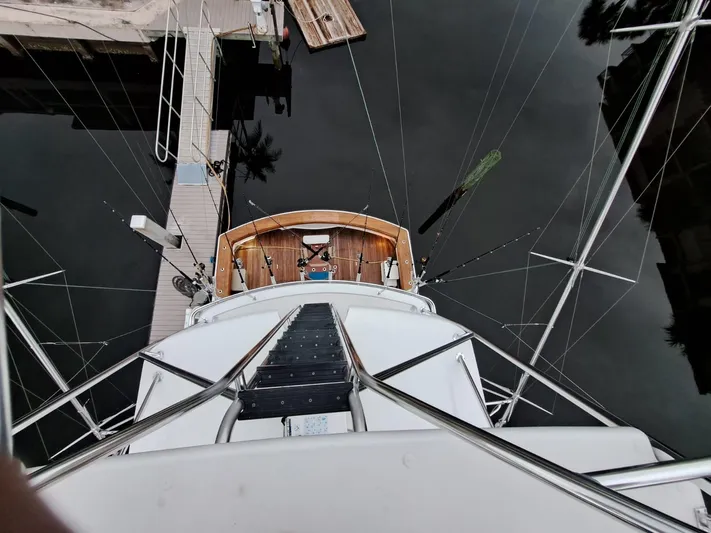 Mary Rose Yacht Photos Pics Aerial view of 2006 Hatteras 68 Convertible yacht docked at marina.