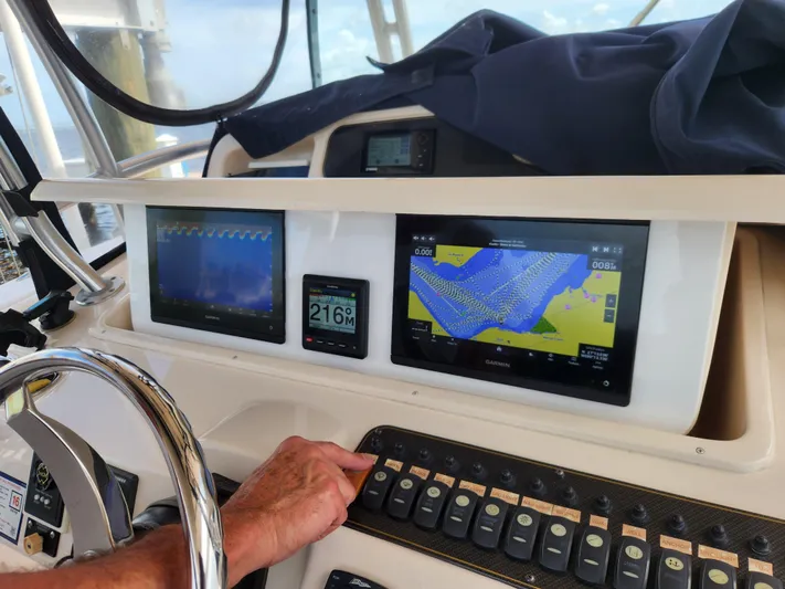  Yacht Photos Pics Grady-White Canyon 336 boat dashboard with navigation screens and controls, 2012 model.