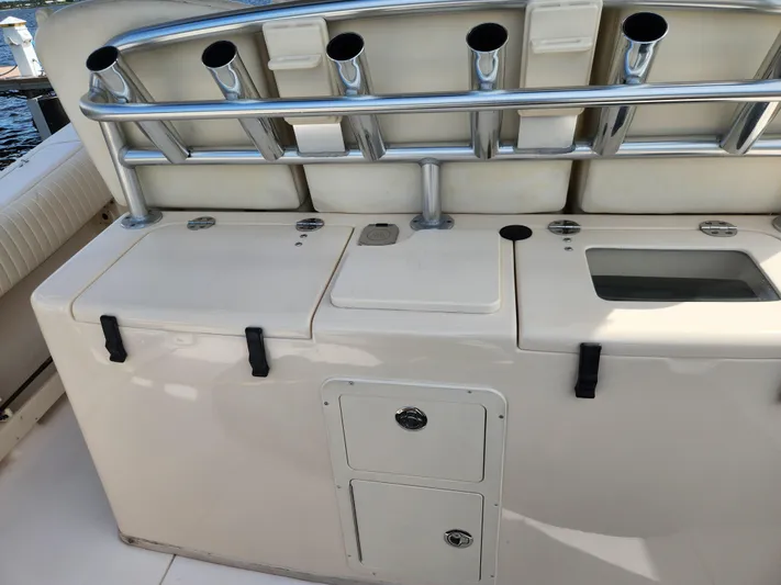  Yacht Photos Pics 2012 Grady-White Canyon 336 boat interior with rod holders and storage compartments.