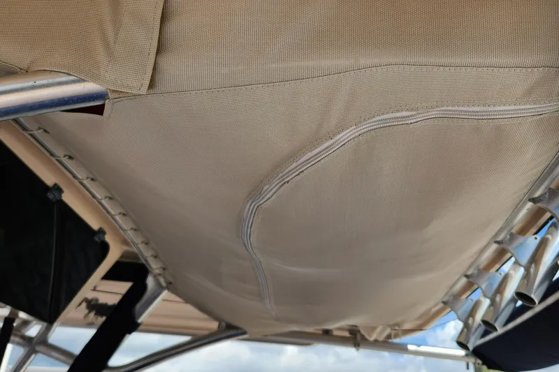  Yacht Photos Pics Canvas canopy and metal frame of a 2012 Grady-White Canyon 336 boat.