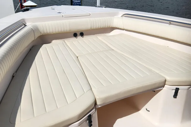  Yacht Photos Pics 2012 Grady-White Canyon 336 boat with spacious cushioned seating area.