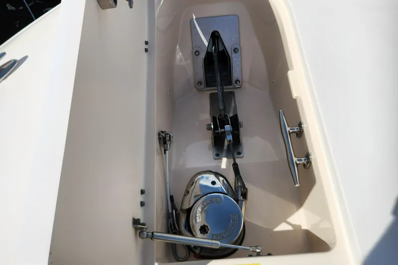  Yacht Photos Pics Anchor compartment of 2012 Grady-White Canyon 336 boat, featuring winch and cleat.
