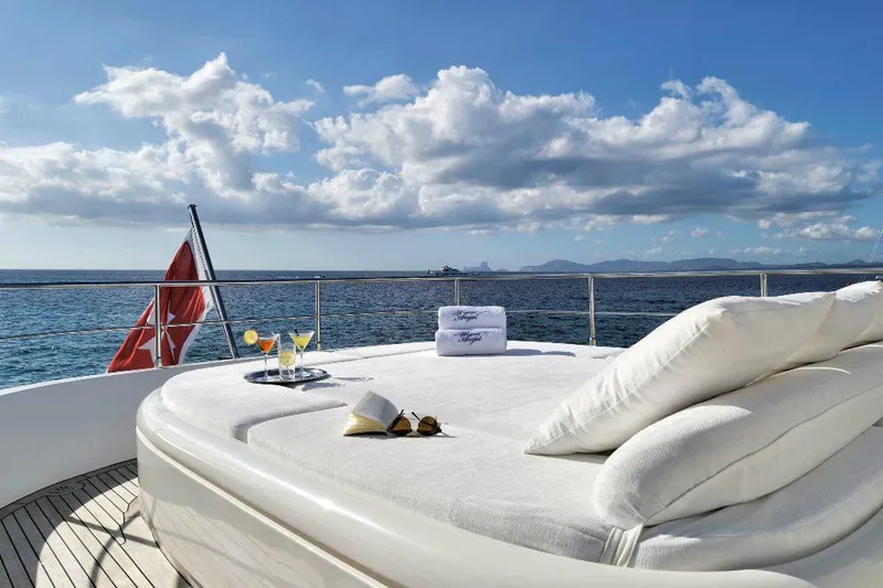  Yacht Photos Pics Luxurious deck of 2008 ISA 120 Sport yacht with ocean view and drinks.